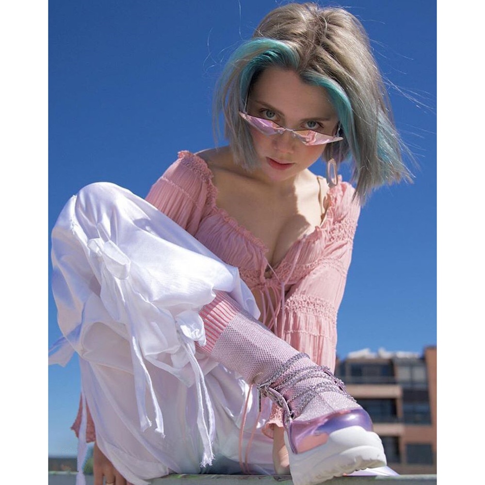 Zonnebril streetwear vleermuisvorm zonnebril dames randloos true film lens  uv400 heren retro vuur vlam