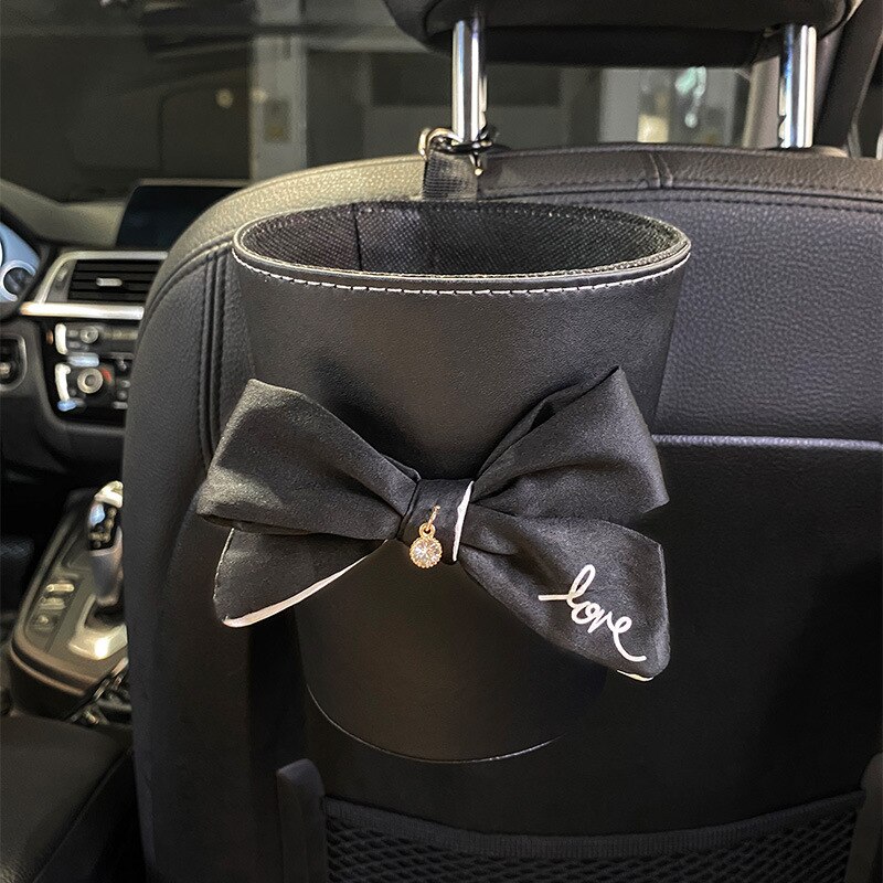 Sac poubelle à nœud papillon pour voiture, mignon, pour siège arrière, appui-tête, Mini sortie automatique, organiseur de ventilation, sac poubelle, boîte de rangement, seau: black stone bow