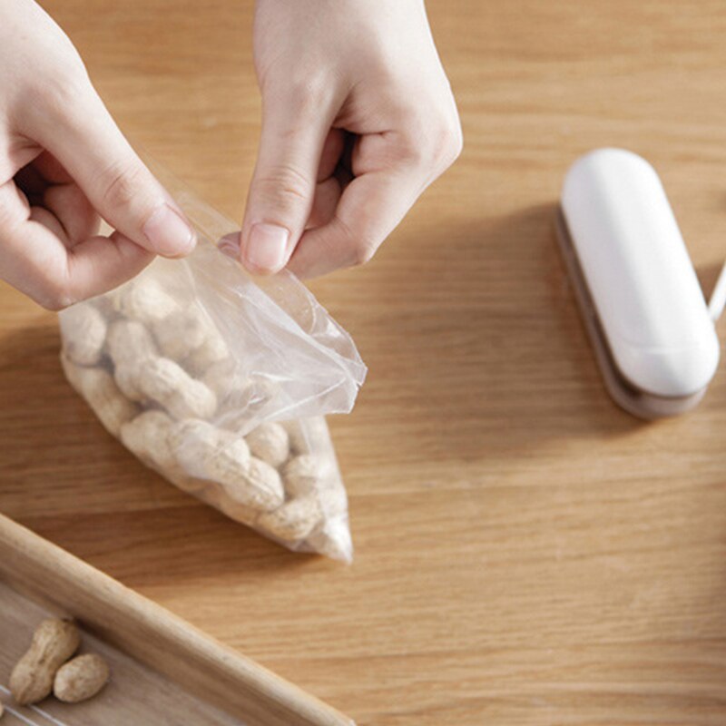 Useful Mini Gadgets Household Machine Portable Mini Sealing Heat Sealer Capper Food Saver for Plastic Bags Package Kitchen Tools