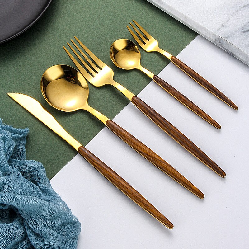Visuell touch lyxigt silver bestick trähandtag guld silver middag bestick set dessert sked gaffel kniv uppsättningar för hemmet kommersiella