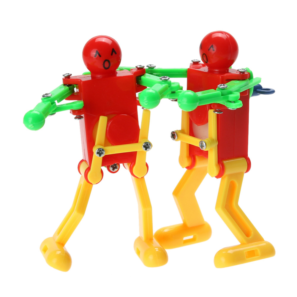verkoop Clockwork Spring Wind Up Speelgoed Dansende Robot Speelgoed voor Kinderen Kinderen Speelgoed swing robot WYQ