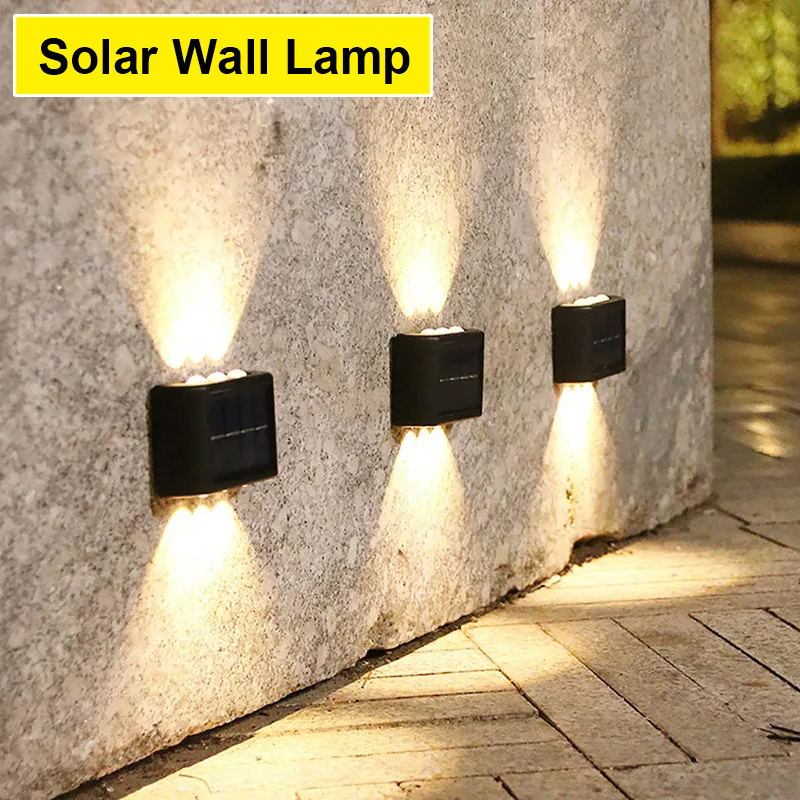 Outdoor Solar LED-wandlampen Waterdichte Led Solar Lamp Op en neer Lichtgevende verlichting voor tuin Balkon Yard Street Decor Lampen
