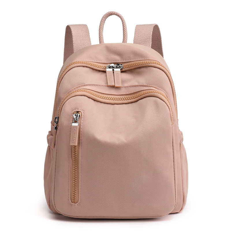 Mochila pequeña versátil a la para mujer, bolso de viaje de ocio de gran capacidad, mochila sencilla portátil para mujer 2025: Rosa