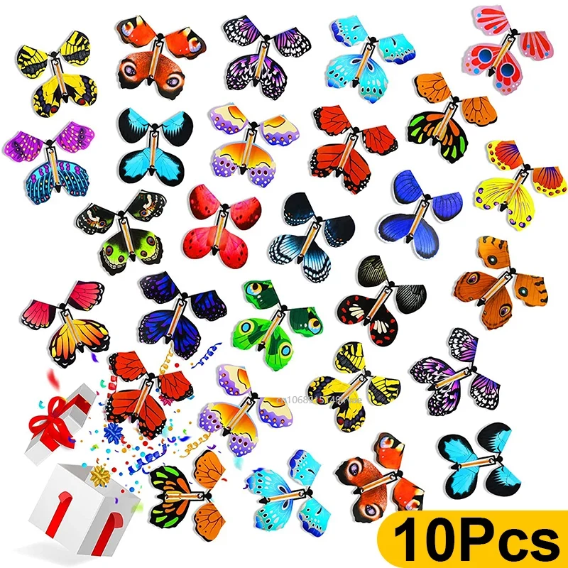 Mariposas voladoras mágicas, juguete de cuerda en el cielo, marcapáginas, tarjetas de felicitación, banda de goma alimentada, accesorios mágicos para niños, sorpresa