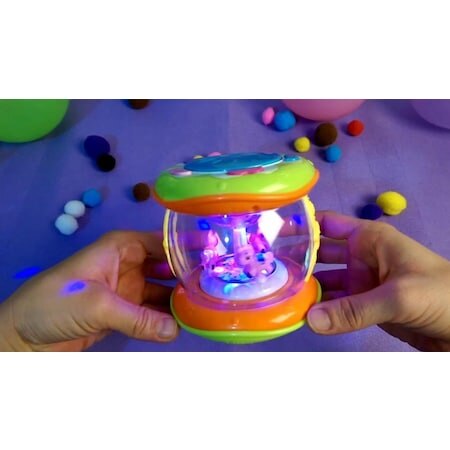Lysende legetøjsfortæller tromle-roterbar monteret fuzzy davulcuk