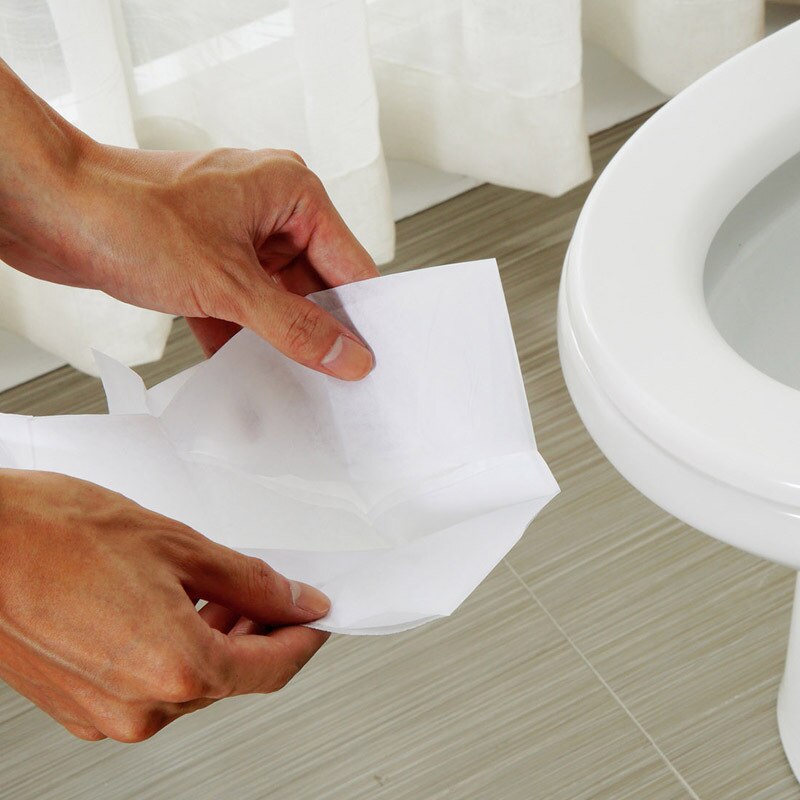 Funda de papel desechable para asiento de inodoro, almohadilla impermeable para asiento de inodoro de viaje, accesorios de baño, 5 paquetes/50 Uds.