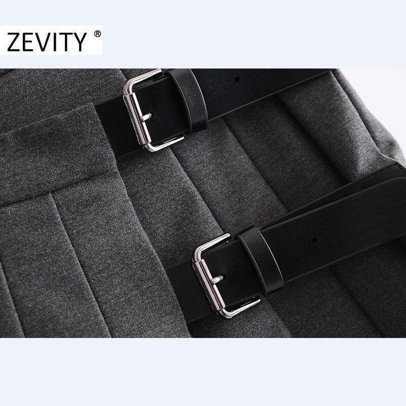 Zevity-Mini jupe plissée pour femme, décoration boucle douce, couleur unie, Style anglais, vêtement Slim et Chic, QUN703, décontracté