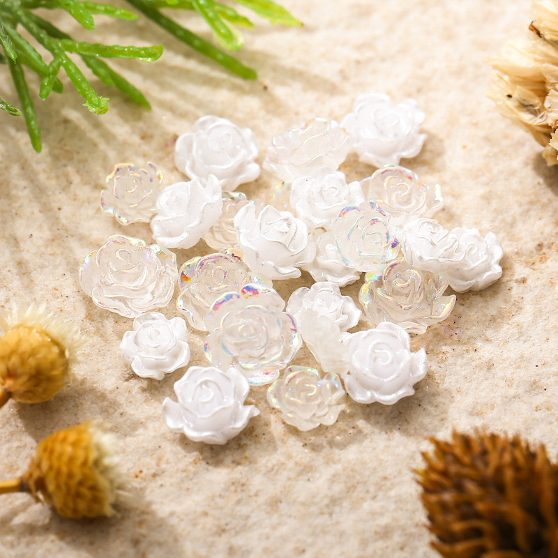 50 Uds. De dijes de flores rosas blancas de 6/8/10MM para decoración artística de uñas de boda, cuentas de perlas de flor de Aurora de resina 3D y pétalos esmaltados