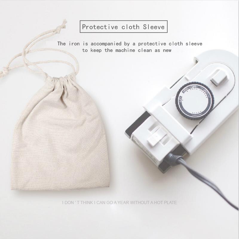 Portable handheld iron Home small mini folding travel clothes hanging ironing machine