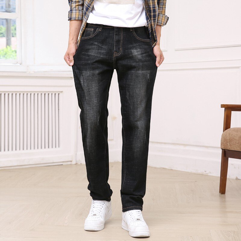 Efterårs stretch bomuld herre jeans med lige ben i klassisk stil mørkeblå denimbukser herre jeans med løs pasform