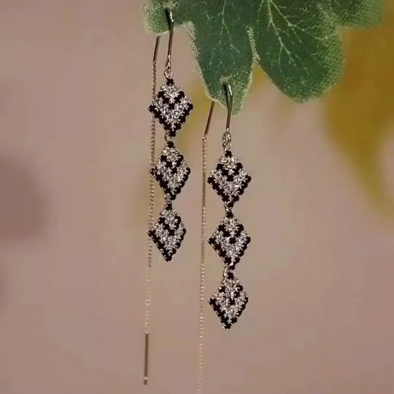 Glanzende lange oorbellen met kwastjes en glitter voor dames, lange oorbellen met kettinghangers, perfect als sieraden voor bruiloften en feestjes.