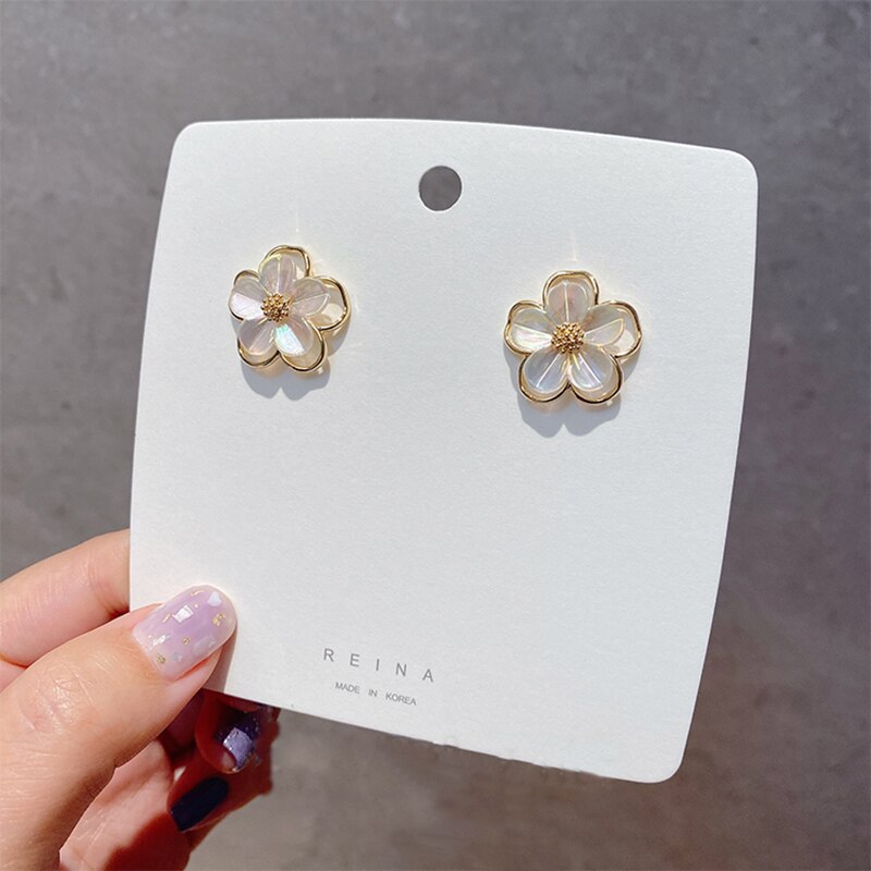 Coreano Nuovo Semplice Ed Elegante Borsette Fiore Orecchini con Perno per Le Donne affrescare Cavità Del Metallo Del Fiore Studenti di Vacanza Del Partito Gioielli Regali