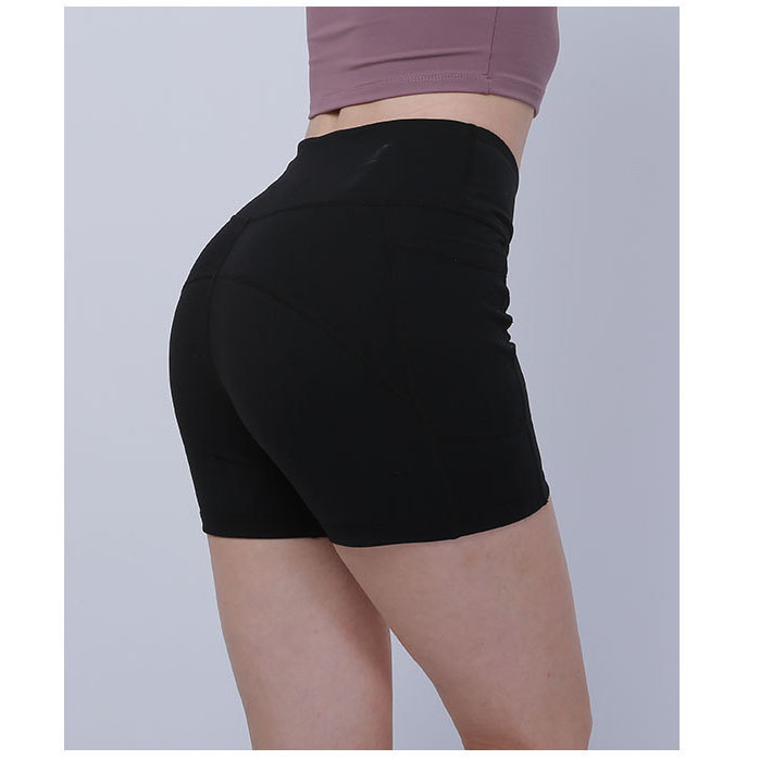 Yogashorts med hög midja för löparbikershorts för kvinnor med fickor