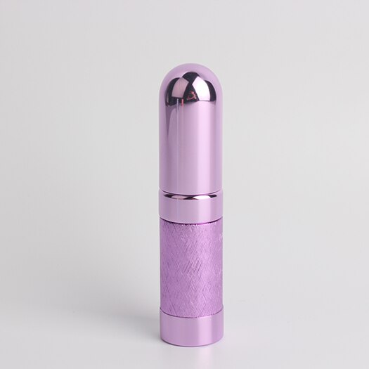 1 stk metal kugle parfume underflaske kosmetisk sprayflaske let bærbar læbestift form skridsikkert mønster tom flaske: Lilla