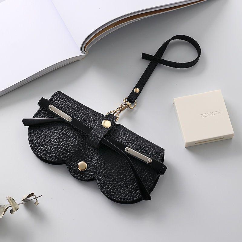 Brillenhülle mit Litschi-Prägung, niedlich, zum Aufhängen, PU-Leder, Sonnenbrille, Lesebrille, Aufbewahrungstasche, tragbarer Reise-Brillenhalter: Schwarz