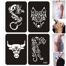 4 designs/sæt airbrush glitter tatovering stencil drage tiger ulv ko gør-det-selv-tegneskabelon henna tatovering stencil tatovering pochoir