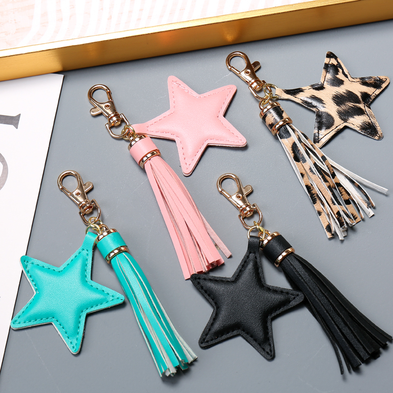 LLavero de borla de cuero PU a la para mujer y niña, colgante de estrella, llaveros con cierre de langosta, accesorios para bolso