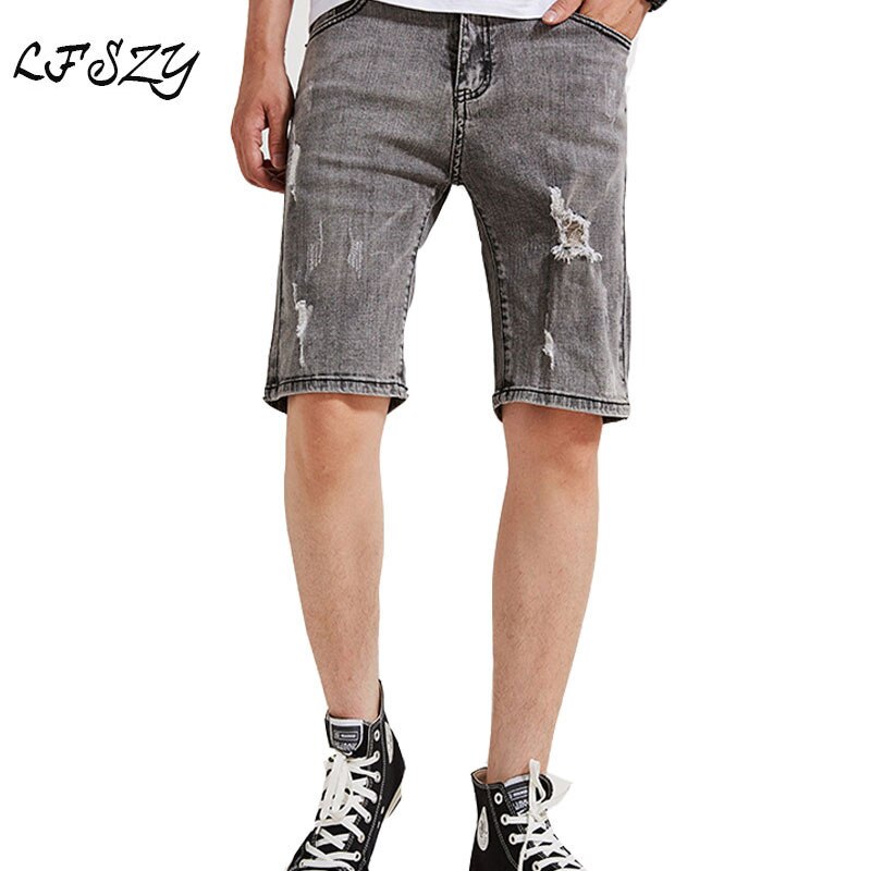 Pantalones cortos de mezclilla para hombre nuevos pantalones cortos de cinco puntos coreanos casuales de tiro medio sueltos elásticos rizados tamaño 28-35 36