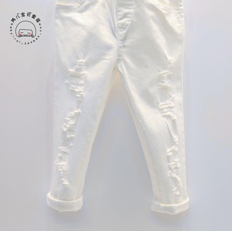 Objekt flicka vita jeans byxa hål