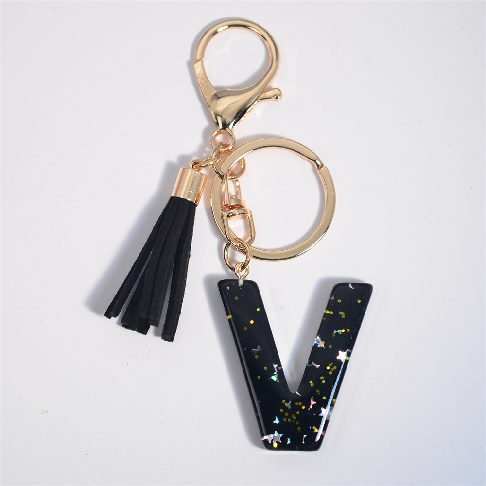Schwarze Initialen A-Z Schlüsselanhänger Glitzer Stern Pailletten Harz Buchstaben Schlüsselanhänger mit Quaste für Frauen Tasche Ornamente Charm Autoschlüsselhalter