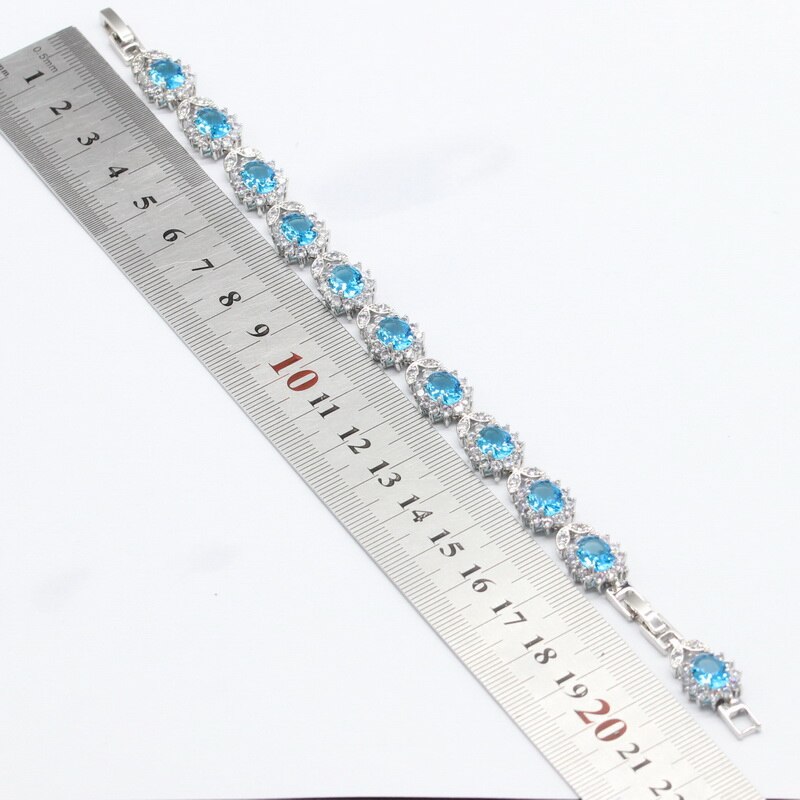 Zilveren sieradensets met blauwe opaal voor dames, kettinghangers, oorbellen en hemelsblauwe kristallen zirkonia armbanden