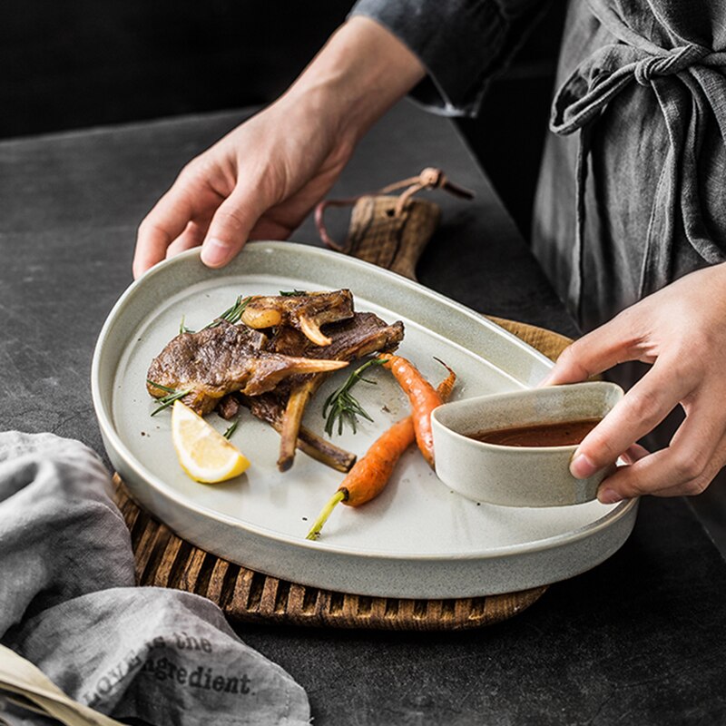 Nordisk keramikugn sväng västerländsk mat biff maträtt krydda maträtt hotellrestaurang display platt frukost sojasås maträtt servis