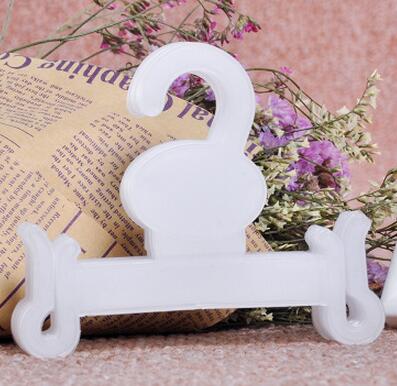 50pcs slipper hanger shoes supermarket sandal hook holder people cotton-padded shoe plastic hook hanger: 4015 Translucent