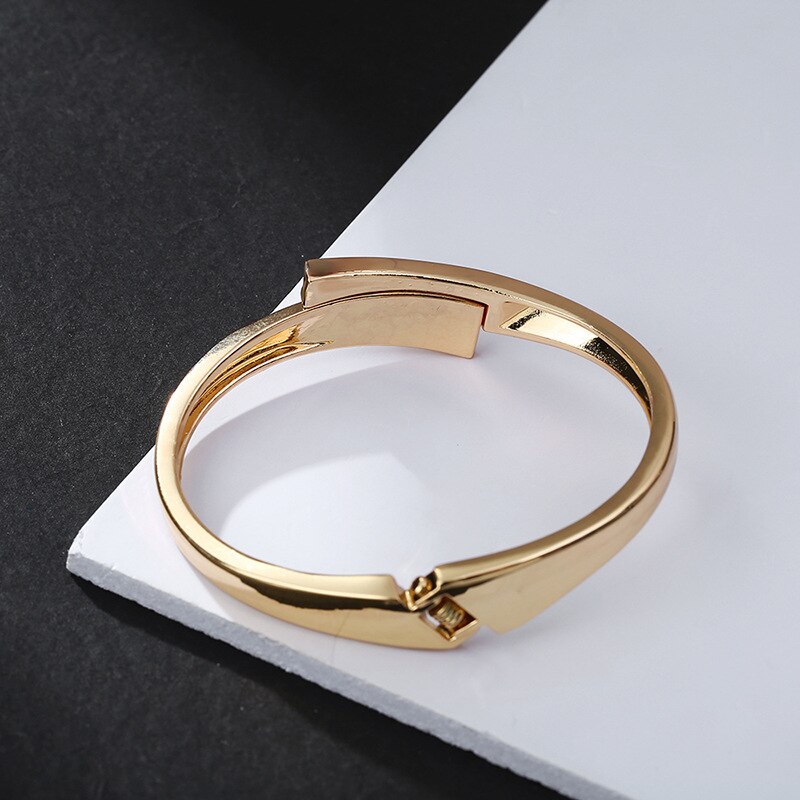 Pulsera de aleación con línea cruzada para mujer, brazalete sencillo de oro, a la , con personalidad