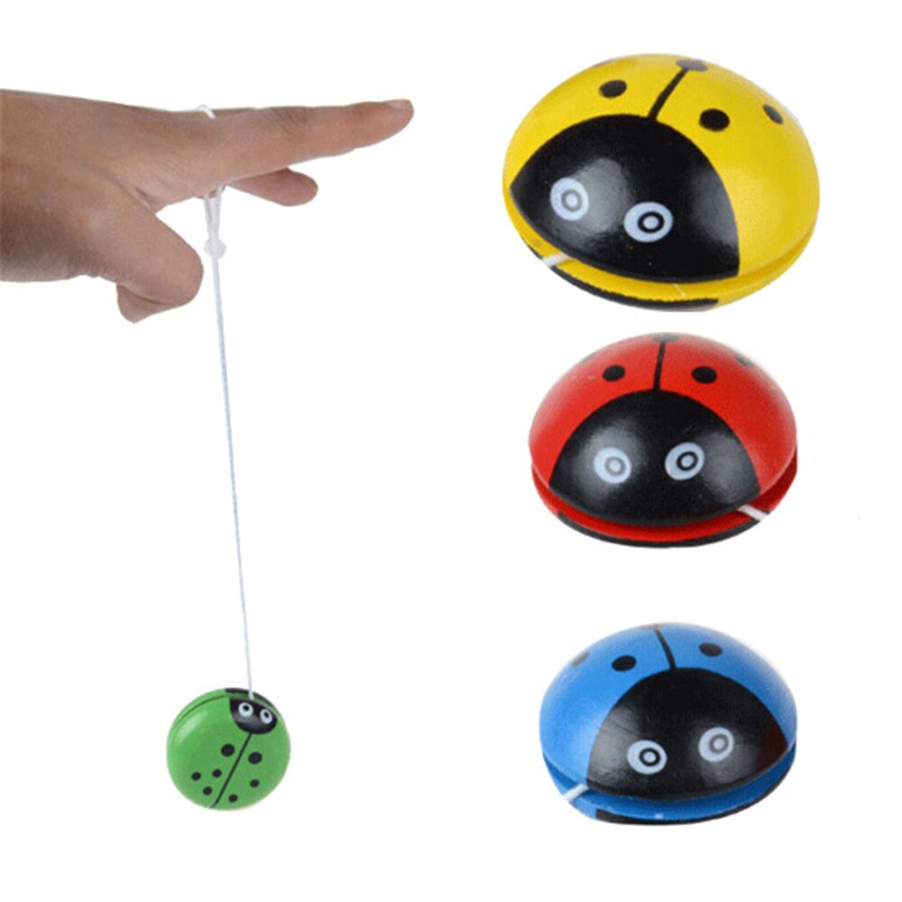 Yo yo legetøj til børn mariehøne yo yo bold blå grøn rød gul mariehøne yoyo legetøj træ tilfældig