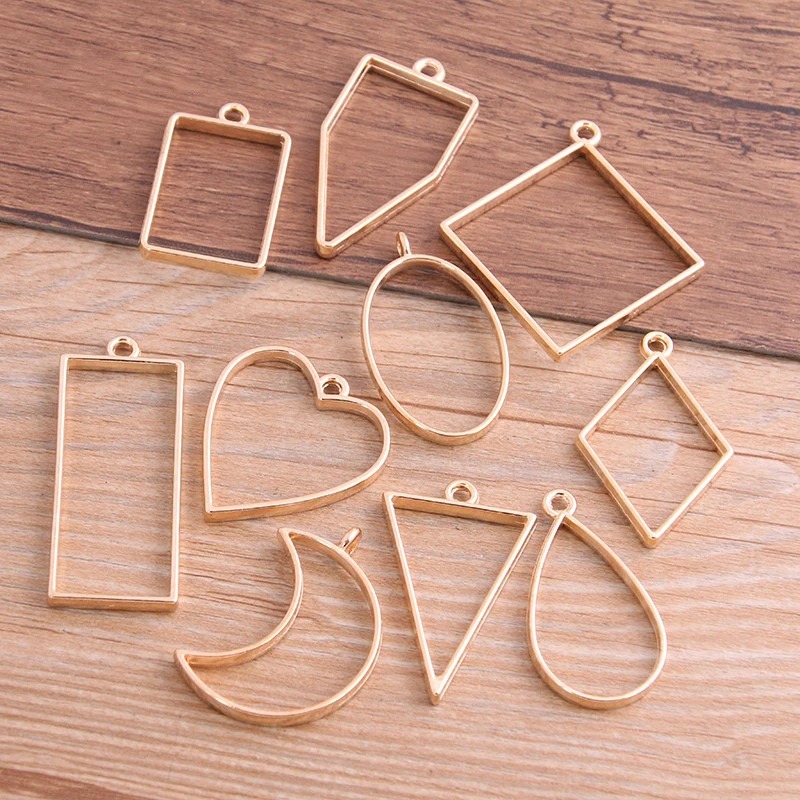 10 stks/30 stks Geometrische Figuur Charme Holle Lijm Lege Hanger Metaallegering DIY Armband Ketting Oorbellen Handgemaakte Bezel Mold