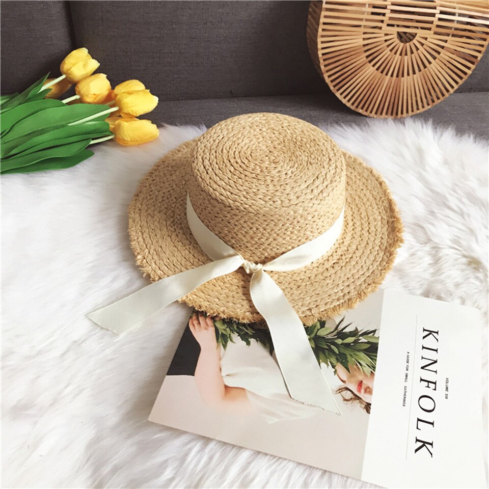 Kvinnor sommar strand raffia solhatt med band rosett raffiahatt temperament platta stråhattar dam båtägare solhatt raffia solhatt: F0093-2