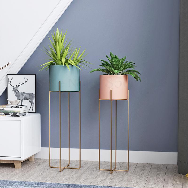 Nordisk gyldent smijern blomsterstativ enkelt innendørs stue gulv moderne minimalistisk blomsterpotte grønn dill stativ balkong