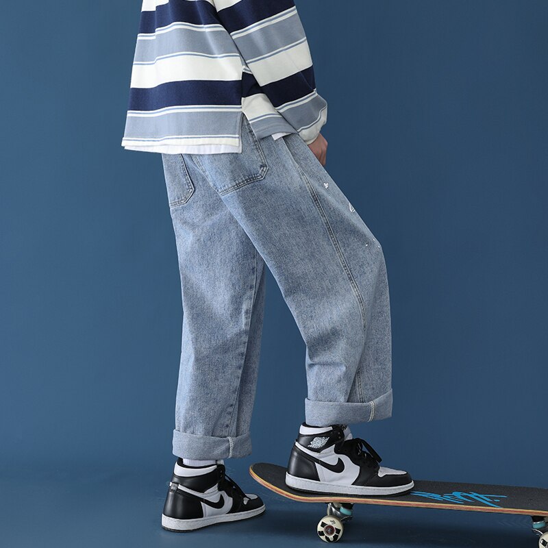 Pantalones vaqueros con Graffiti hombre recto skateboard chic suelto sal serie versátil ancho de la pierna de papá de venta al por menor ropa informal estilo hip hop