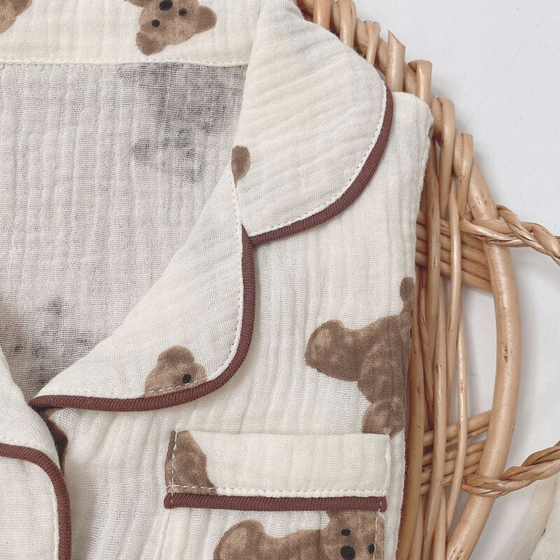 Pigiama per bambini primavera autunno Cardigan e pantaloni orso stampato manica lunga Comfort carino neonato ragazza cotone Musline filato indumenti da notte