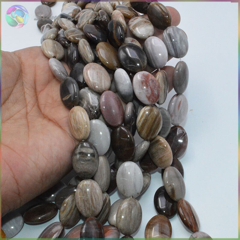Africano Natural de piedra madera petrificada inflado Oval perlas 13x18mm