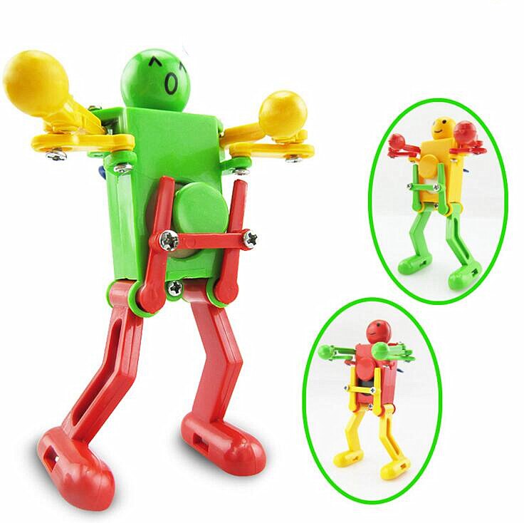 verkoop Clockwork Spring Wind Up Speelgoed Dansende Robot Speelgoed voor Kinderen Kinderen Speelgoed swing robot WYQ