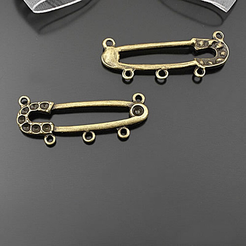 (20746) in Lega di zinco Pulsante Spool Ago Per Cucire Ruota Che Gira Righello Nappe Lane E Filati Abbigliamento Modello di Lavoro A Maglia Pendenti E Ciondoli Più Stili: 25561-43x15MM 20PCS