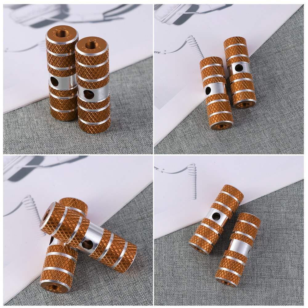 Een paar aluminiumlegering fiets cilinder stoel as stunt pegs voor mountainbike (zwart): Gouden