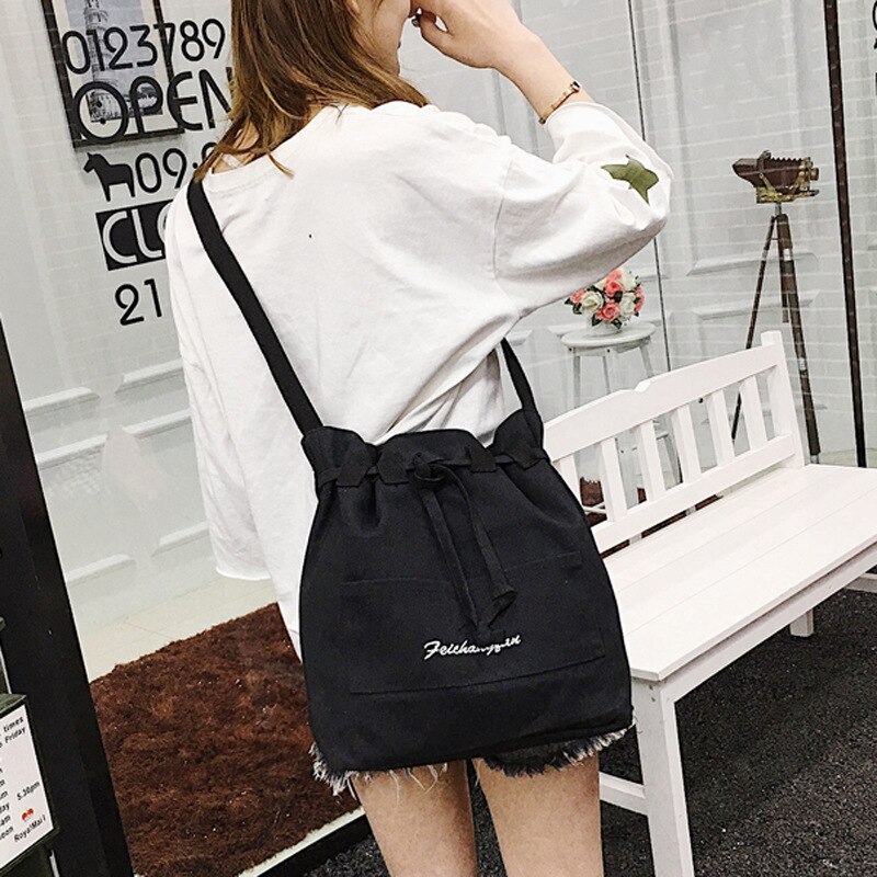 Nian lente en zomer koreaanse versie van de eenvoudige emmer canvas tas schouder laptop bulk tas messenger vrouw