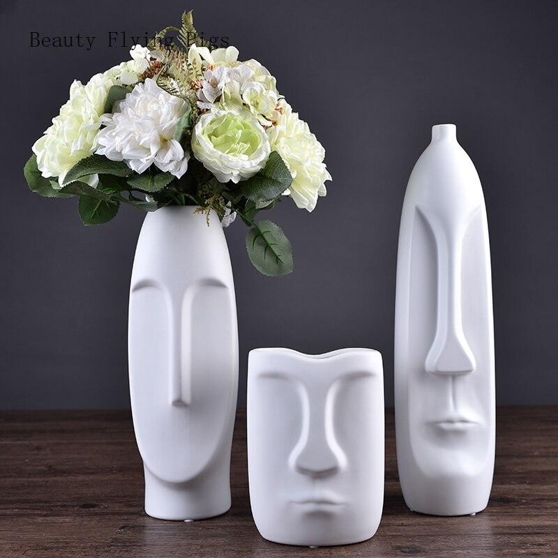 Nordisk stil moderne boligdekorationer keramisk ansigtsvase dekoration stue blomsterarrangement kunsthåndværk møbler
