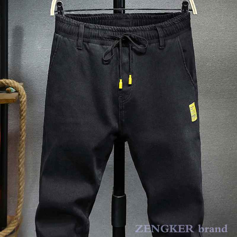 Pantalones vaqueros holgados de estilo japonés para hombre, pantalón harén de terciopelo elástico de talla grande, con cordones, color negro, 7XL, 6XL