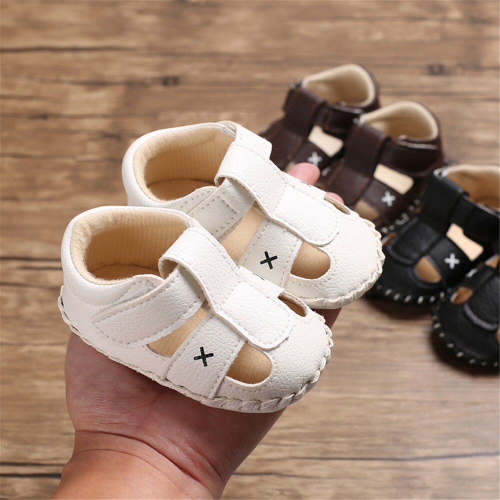0-12M sandali per neonato estate PU scava fuori scarpe da passeggio traspiranti per bambini calzature piatte con suola morbida antiscivolo