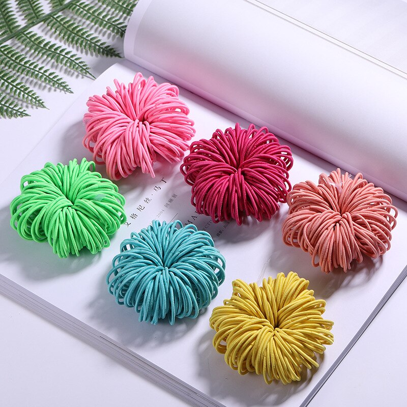 100 unids/lote Color caramelo chicas de Nylon 3CM bandas de goma de la seguridad de los niños elástico bandas de pelo de cola de caballo titular Niños Accesorios para el pelo