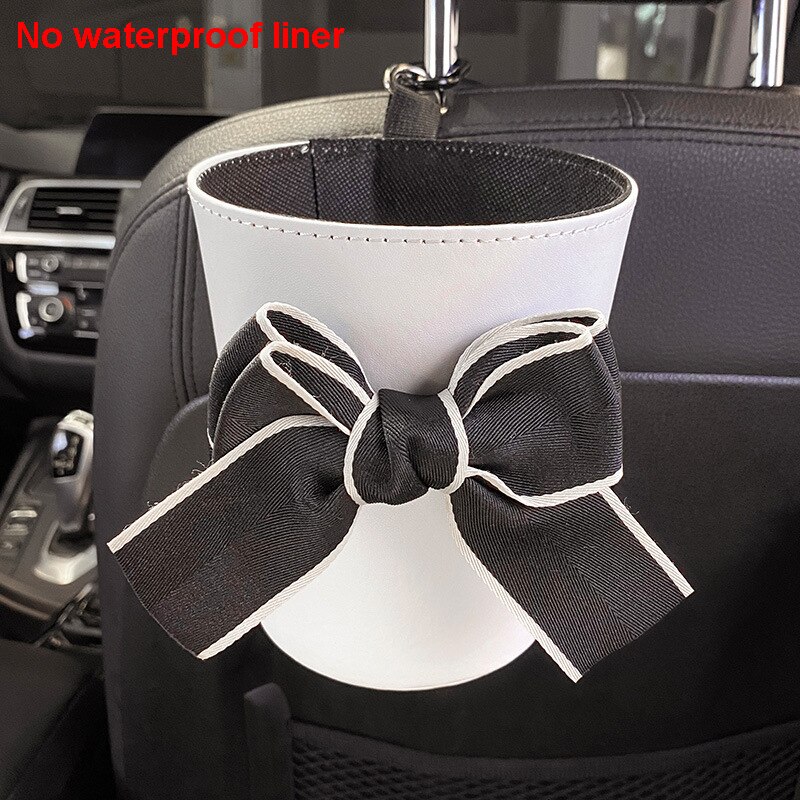 Sac poubelle à nœud papillon pour voiture, mignon, pour siège arrière, appui-tête, Mini sortie automatique, organiseur de ventilation, sac poubelle, boîte de rangement, seau