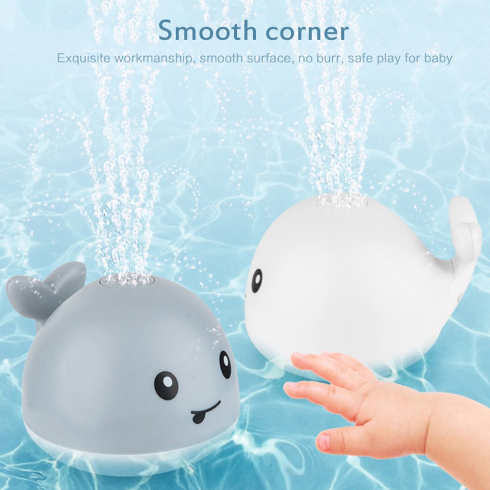 Juguete eléctrico de inducción de agua con forma de ballena, juguete eléctrico con luz y música para bebé, baño exquisito