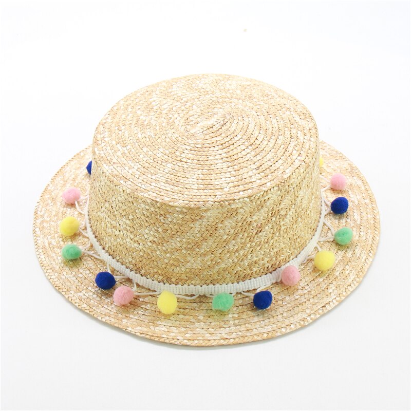 Crianças & adulto bonito borla pompons chapéu de palha meninas chapéu de praia com corda elástica plana topo feminino verão chapéu de sol atacado
