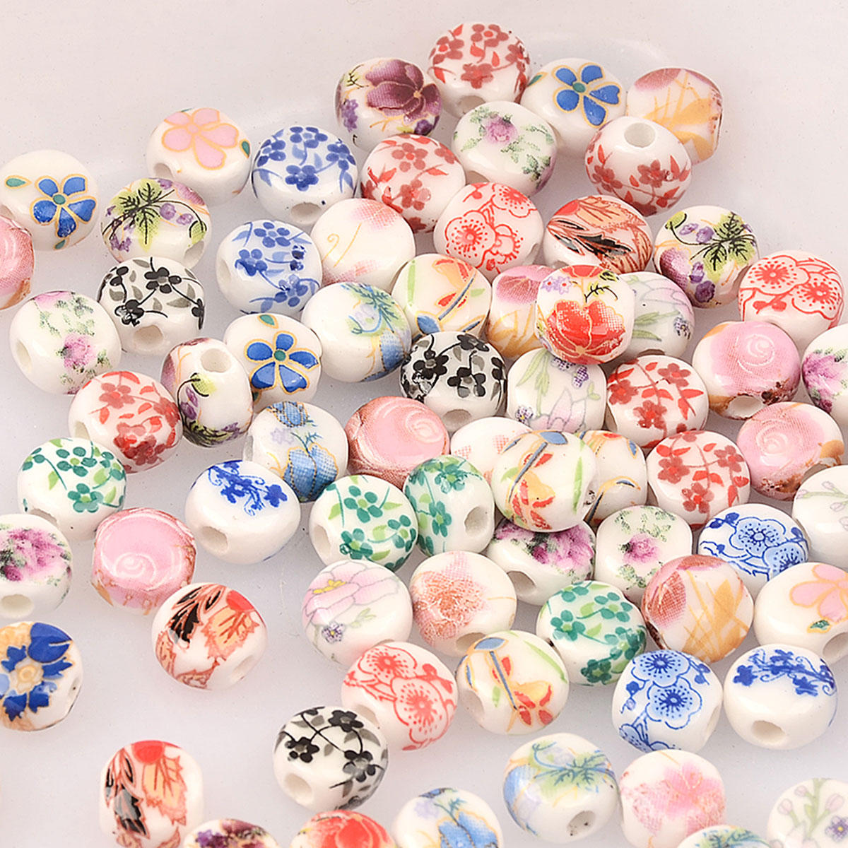 0.8cm 20 . tilfældig farveblanding blomstermønster oblate keramikperler gør-det-selv løse spacerperler porcelænsperler armbånd vedhæng