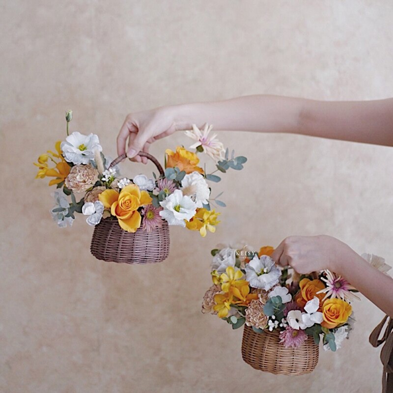 Cesto di fiori intrecciati cesto di immagazzinaggio in Rattan cesto di fiori fatto a mano cesto di fiori fatti a mano per la decorazione domestica di nozze