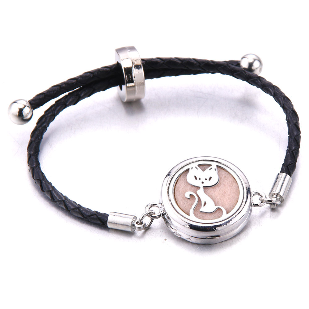 Difusor de aceites esenciales de Perfume, pulsera de cuero, medallón de aromaterapia, medallón de acero inoxidable, pulsera de cuero negro,