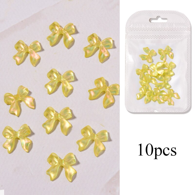 10 stk/pose blanding farger 3d nordlys sløyfer spiker rhinestones diy dekorasjon negle krystall smykker bånd sommerfugl manikyr tilbehør: Gul
